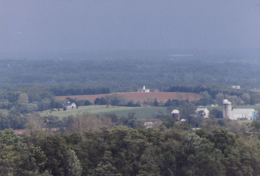 This is a shot of the alien site landing, in 1979. Notice how the ground is still brown around the structure.